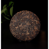 Bajiaoting Valley Flower Tea 357g Pu'er KONG QUE ZHI XIANG QI ZI BING