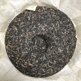 Silver Needle Tributary Puer Meng Hai Qiao Mu Ye Sheng Cha Pu'er 250g