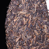 Silver Needle Tributary Puer Meng Hai Qiao Mu Ye Sheng Cha Pu'er 250g